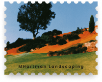 An M. Hartman Landscaping Email & SMS case study stamp styled as a postage stamp, showing a painted hillside of green lawn, sunlit orange slopes, trimmed shrubs and a lone tree, evoking the Scranton, PA landscaping firm's work.
